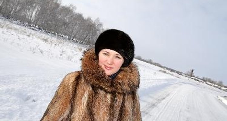 The woman walking on the winter road