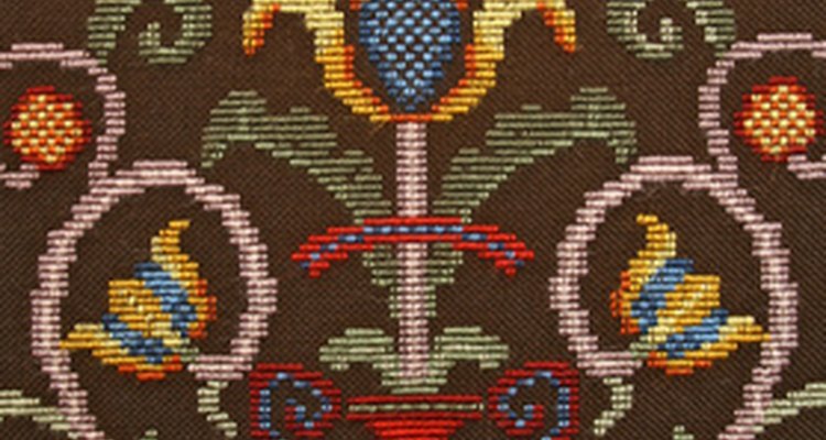 Use iron-on transfer paper to create the tapestry designs you choose.