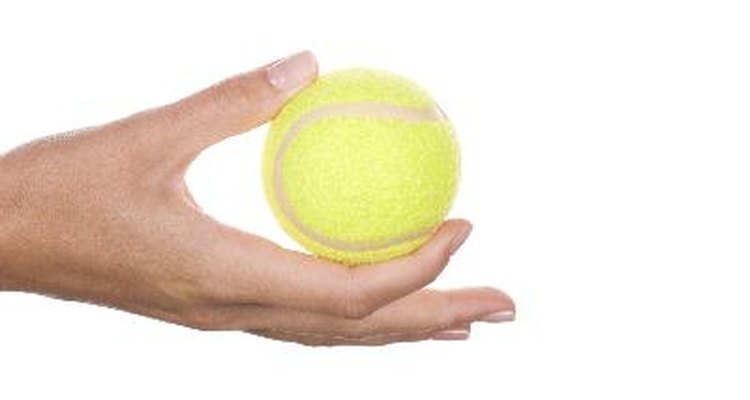 Squeezing an object like a tennis ball can help improve shaky hands.
