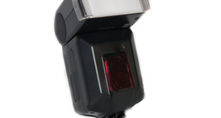 You can use a variety of methods to simulate a camera's flash in a theatrical production. Your budget and the level of the production should determine your choice.