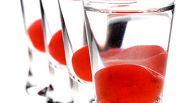 Antique shot glasses can be distinuished by a maker's mark or an original design.