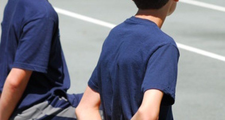 Ball boys waiting for action.