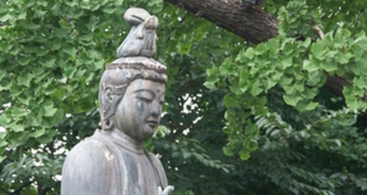 An antiques expert can identify old Japanese figurines.