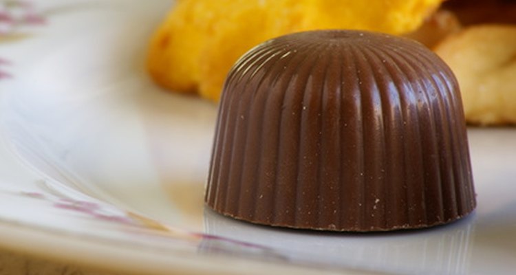 Moulded chocolate can be kept from sticking to candy moulds with just a little effort.