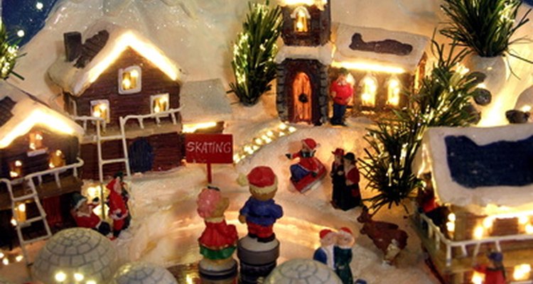 Haz tu propio pueblo navideño con colores de brillantina variados y nieve artificial.
