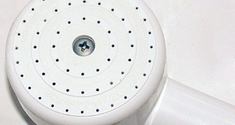 Get rid of water deposits restricting the flow of your showerhead.