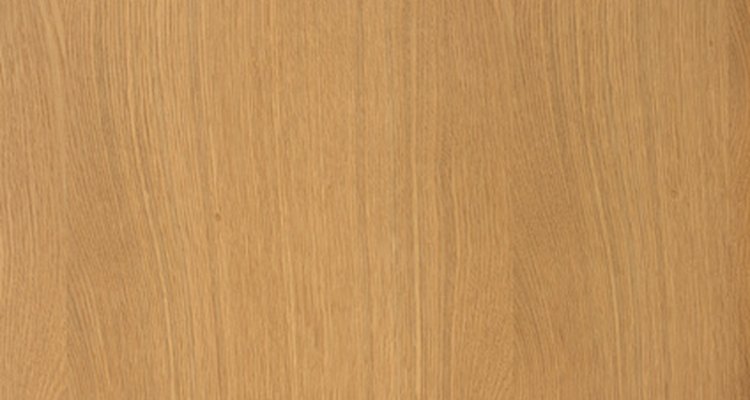 Apply stain and varnish to limed oak to restore its natural finish.