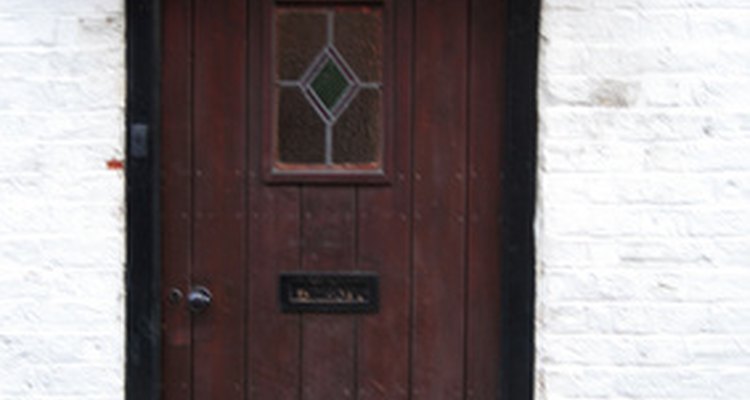 Oxalic acid bleaches away dark stain on oak.