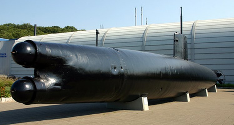 Submarines have periscopes sticking up from their masts.