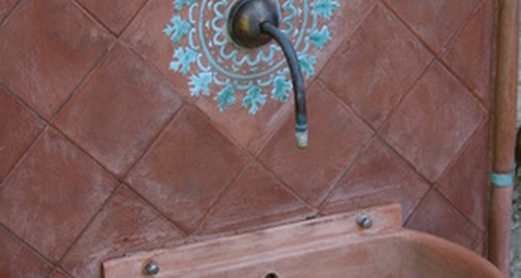 Wall mount faucets can go as high as you wish.