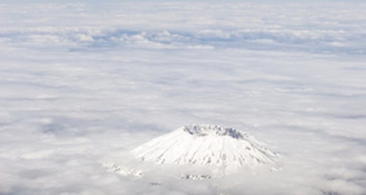 Volcano top peeking through the clouds