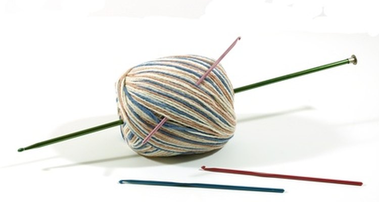 Use uma agulha de crochê para deixar seus dreads certos
