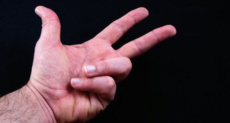 Many deaf people use sign language to communicate.
