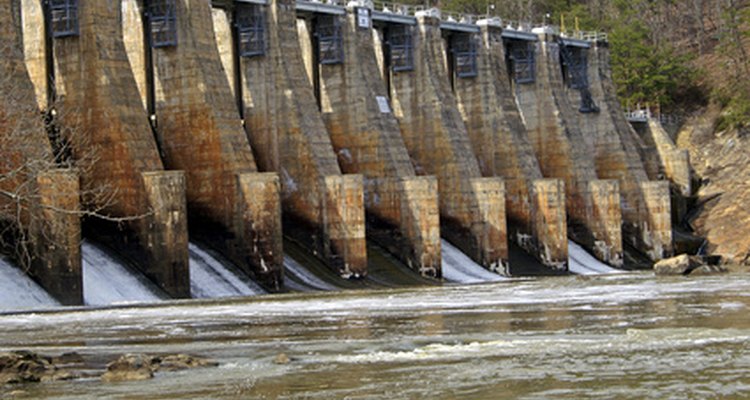 Hydroelectric dams turn turbines, which in turn generate electricity.
