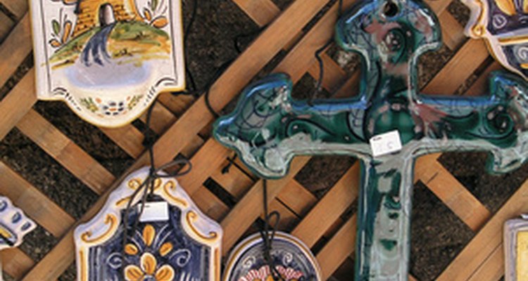 These trinkets are decorated with the coloured glass paste known as enamel.
