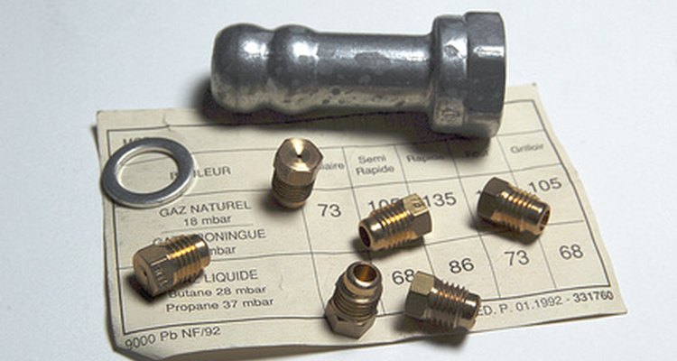 The nozzle that connects the tank to the hose is termed a compression fitting.