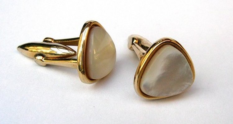 Gold cuff links are appropriate favours for guests.