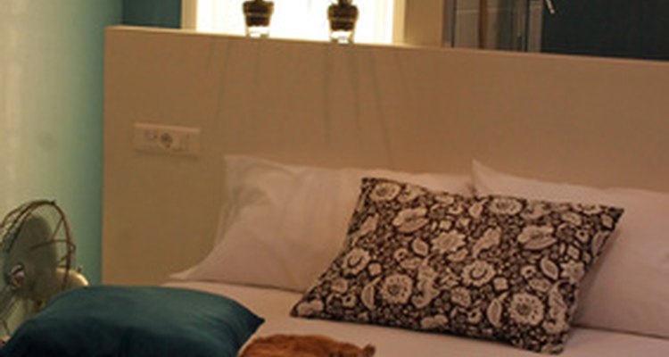 A bedspread is typically decorative, while a duvet is meant to be used as a blanket for warmth.