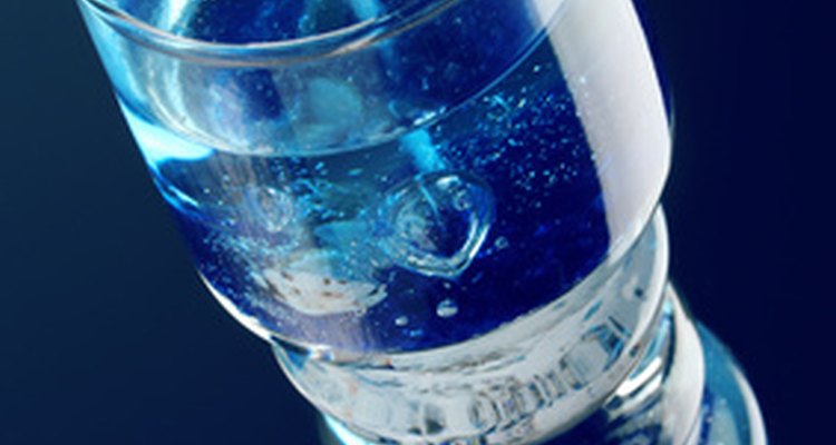 The transparent gel found in gel candles is a great backdrop for embedded objects like pressed flowers.
