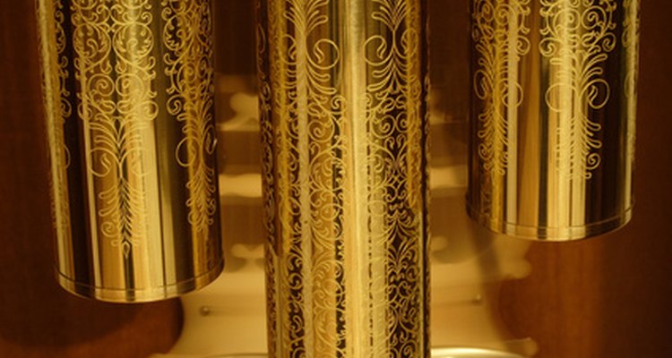 Visible pendulums and weights identify the longcase clocks.