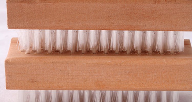 The baking soda scrubs of the stains with the aid of a nail brush.