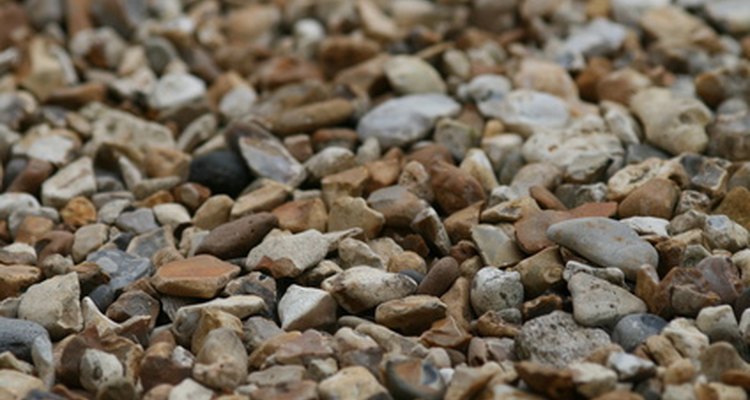 Cleaning pea gravel uses several tools.