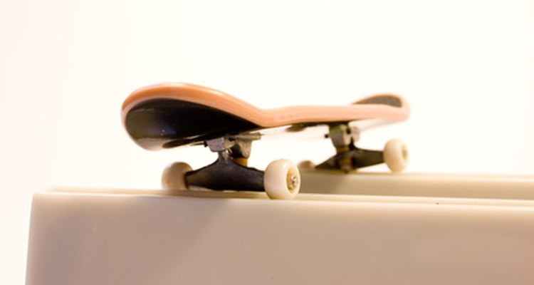 Adjust the wheels and trucks on a Tech Deck, even if you've lost the yellow tool.