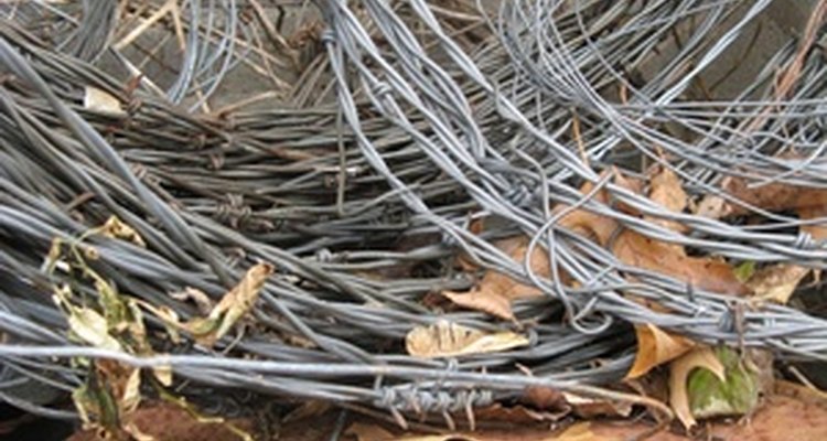 Solder steel wire the same way you solder silver wire.