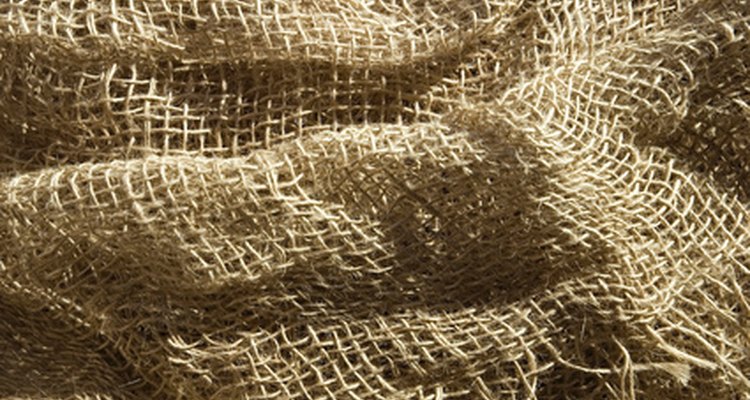 Mold the balloon with soaked burlap.
