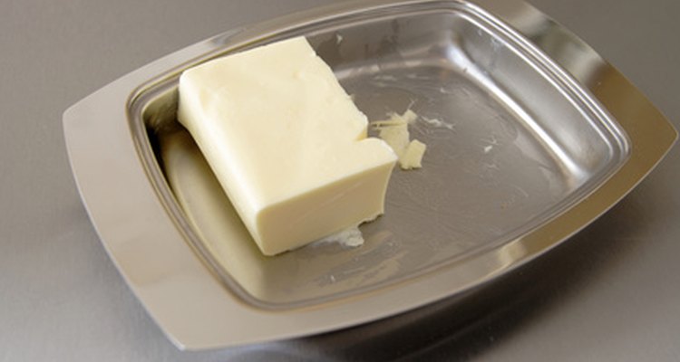 Margarine softens Super Glue.