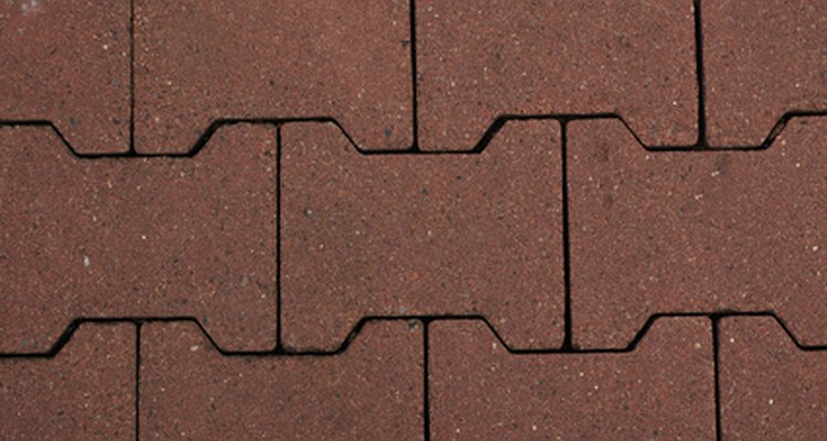 Use a hammer drill to bore through hard surfaces like stone.