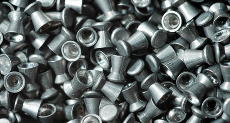 A Crosman 2250 air rifle shoots pellets using compressed carbon-dioxide gas.