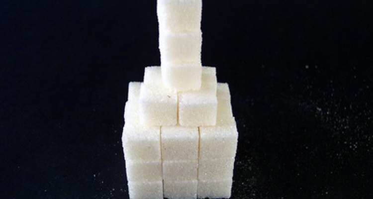 Make sugar cubes stick together with glue or icing.