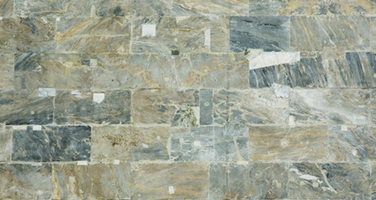 Abrade the marble tile to promote adhesion.