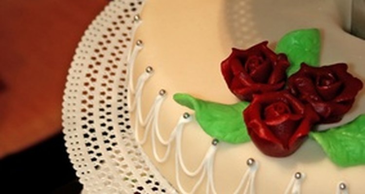 Royal icing swags add elegance to a wedding cake.