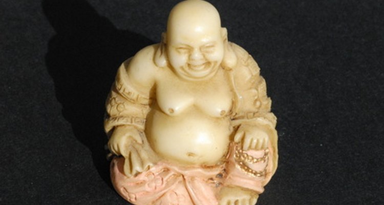 A estátua de Buda sorridente é associada com boa sorte e fartura