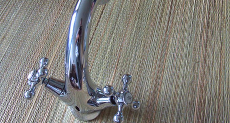 Center set faucets have a shared base for the spout and water controls.