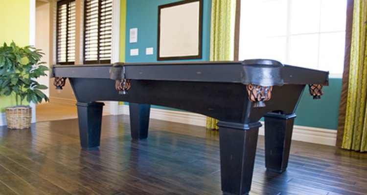 Moving a pool table is a multi-person job.