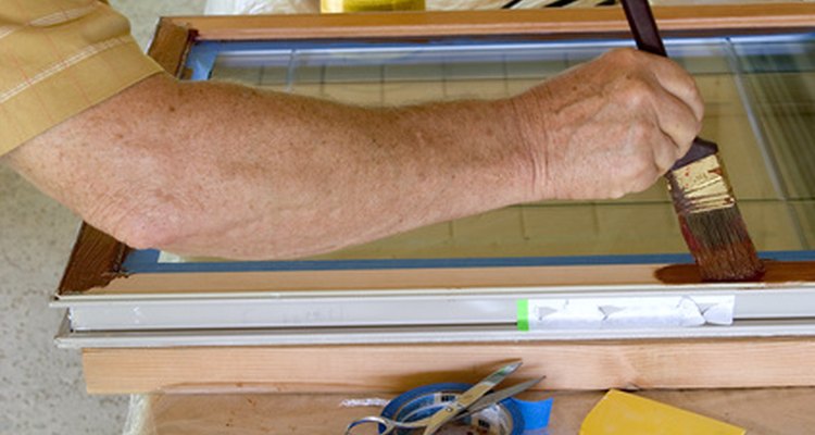 Apply wood stain in the direction of the grain.