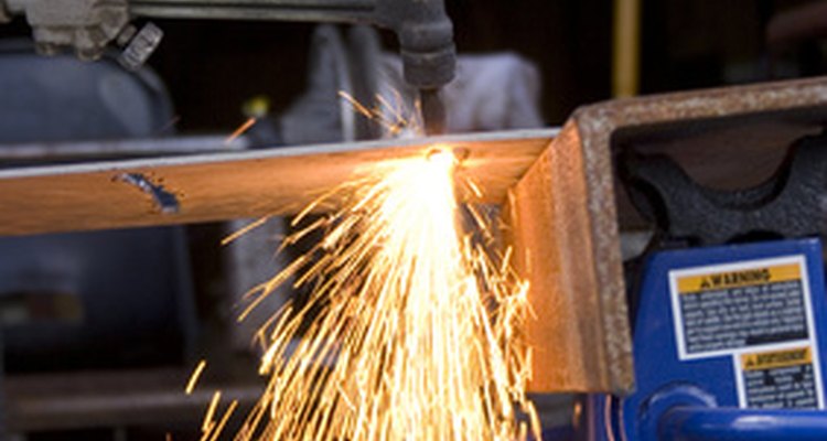 Torch heat eases the process of straightening bent metal rods.