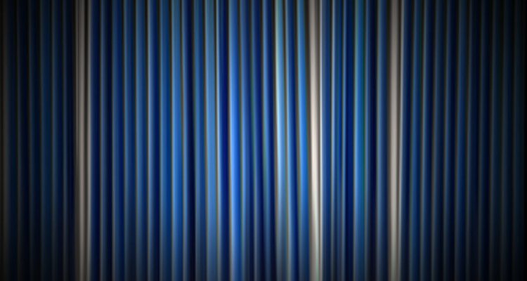 Straight vinyl vertical blinds are easier to adjust and close.