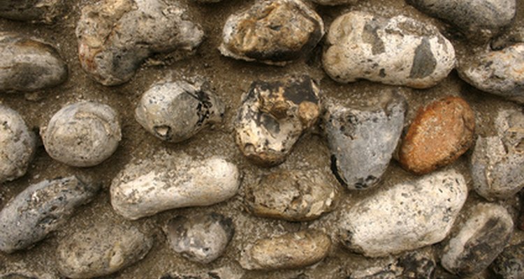 Stone cladding sometimes consists of stones glued to the side of a wall.