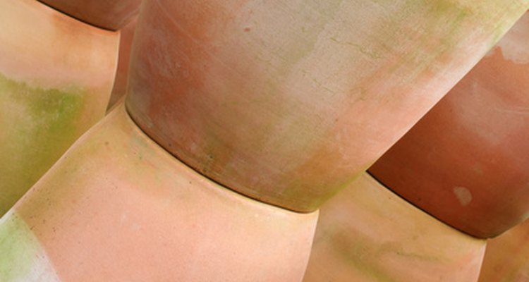 Glue together a broken terra cotta pot with a special epoxy glue made for ceramics.