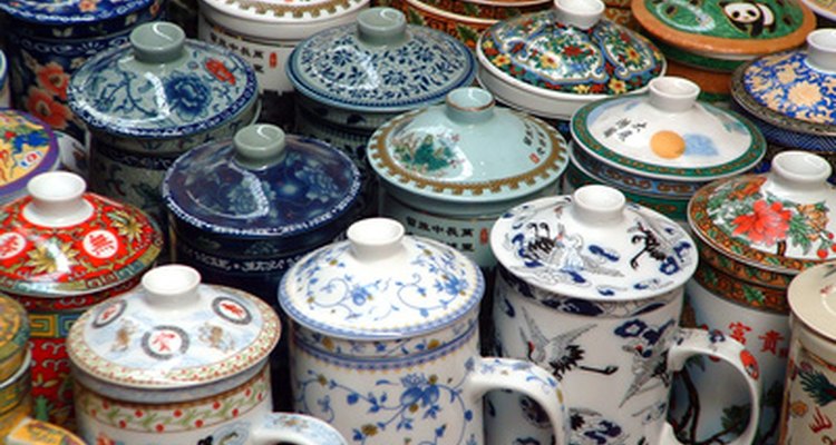 A fancy china teapot accenuates the Victorian theme of a tea party.