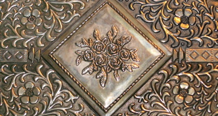 Brasso polishes and removes scratches from many different kinds of metal.