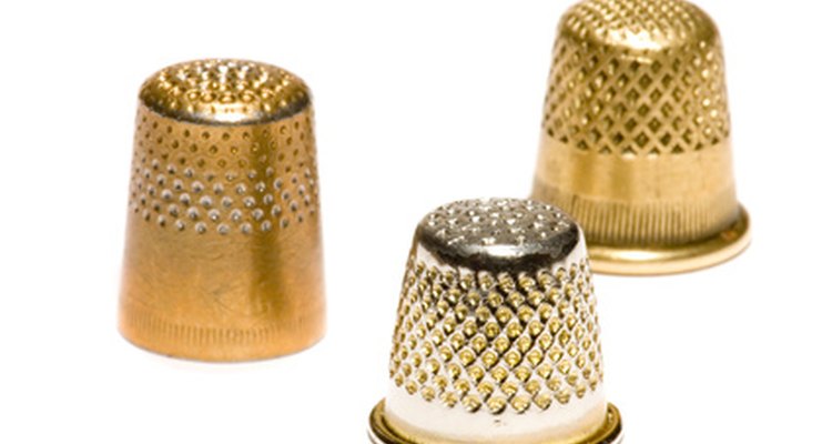 Brass, silver, gold and other materials have been used to protect needleworkers' fingers.