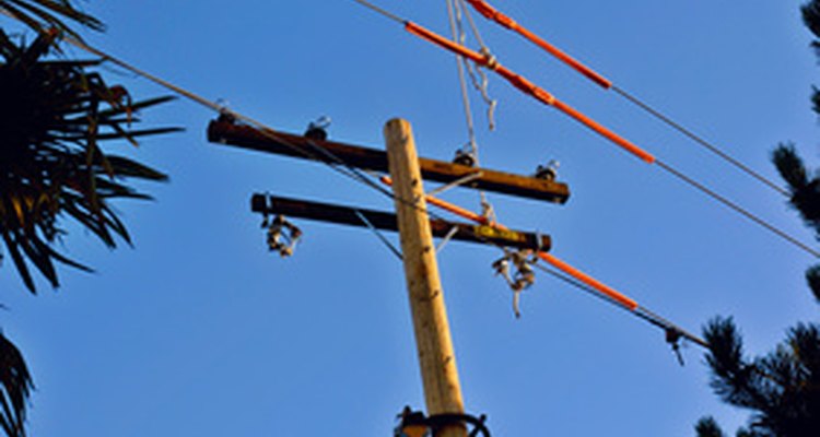 Cherry picker bucket trucks lift workers for elevated jobs.