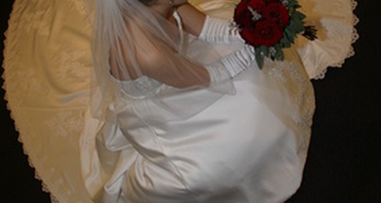 Trains add a dramatic finish to traditional wedding gowns.