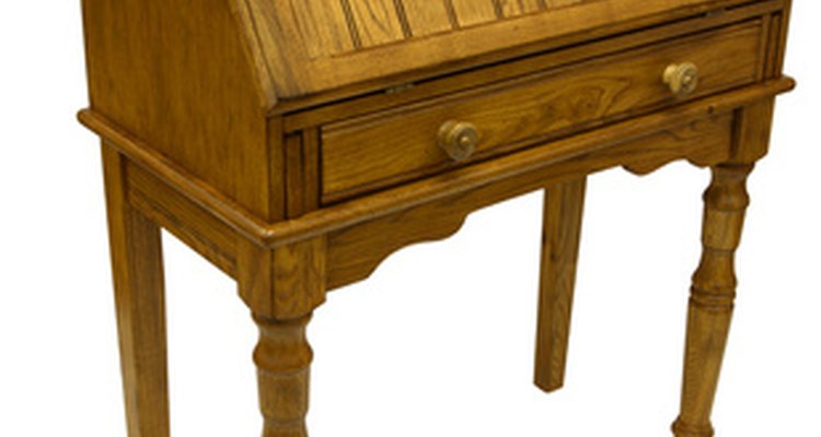 Vintage writing desks typically have a leather top or inlay.