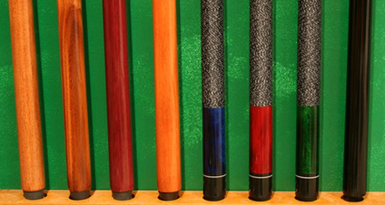 The one-piece snooker cue is shorter than two-piece pool sticks.